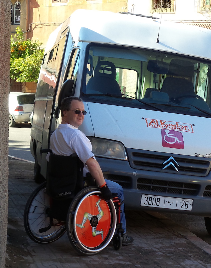 Accessible vehicle blocking the pavement