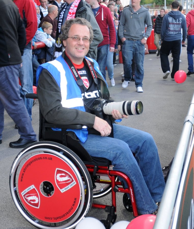 Morecambe FC photographer in a wheelchair