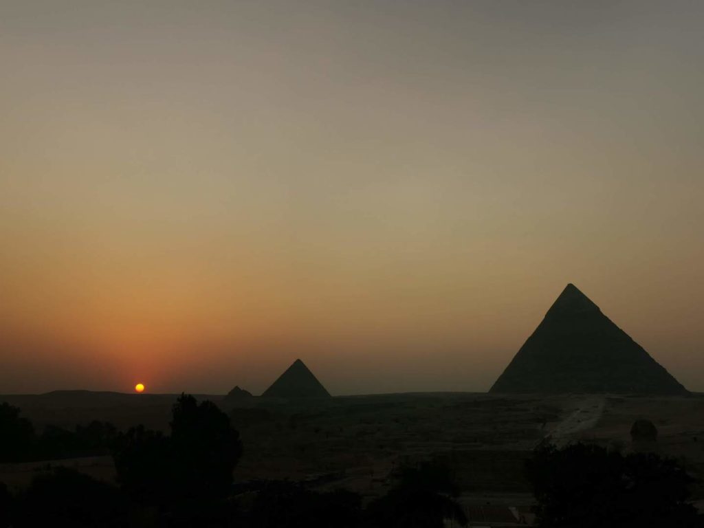 Sunset behind the pyramids